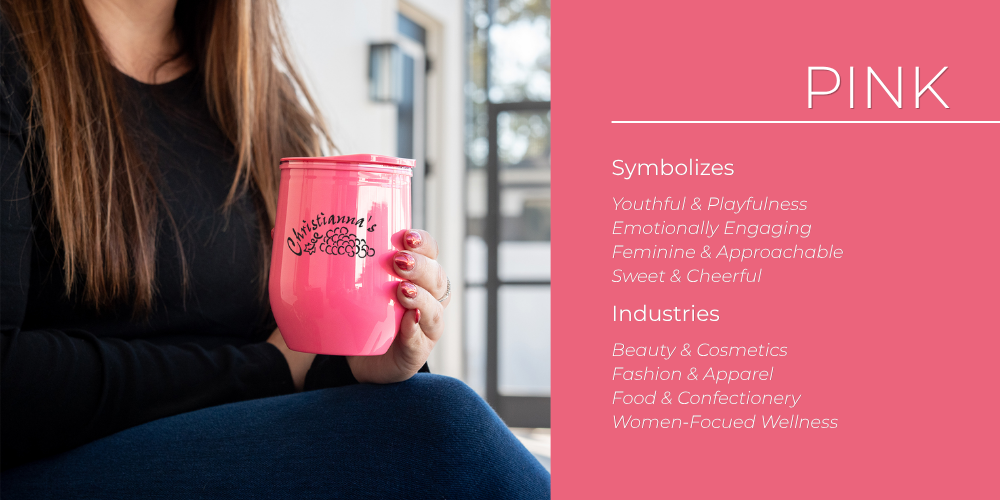A pink custom tumbler held in a quiet moment, a promotional item reflecting pinks playful, approachable charm