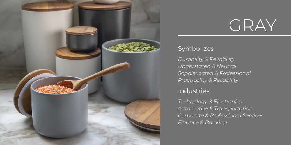 A set of gray ceramic storage canisters styled as corporate merch, reflecting the understated, reliable tone gray brings to branding