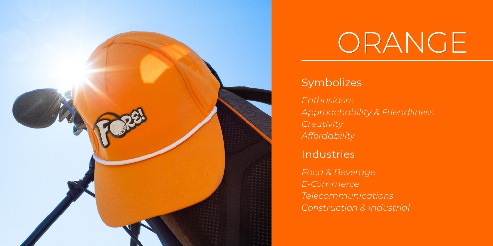 An orange embroidered golf cap resting on a golf bag, branded swag reflecting oranges friendly, energetic personality