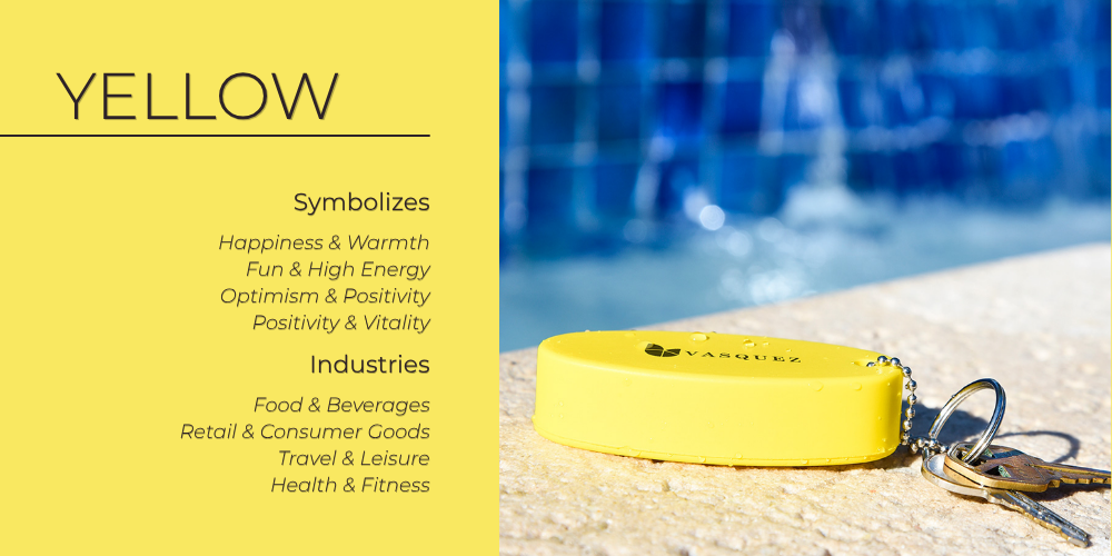 Yellow floating keychain giveaway resting poolside, showcasing yellows cheerful, high-energy brand vibe