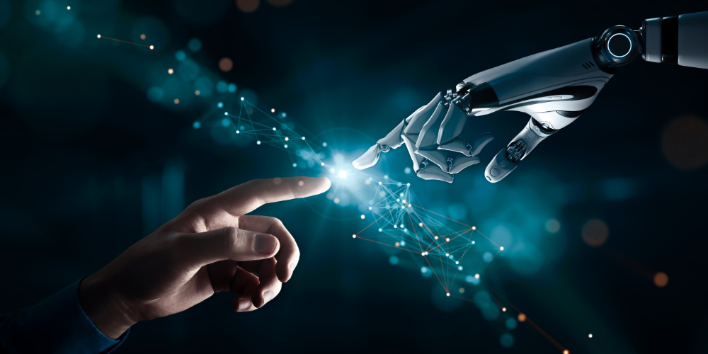 robotic and human hands reaching toward each other, symbolizing AI paired with real human interaction