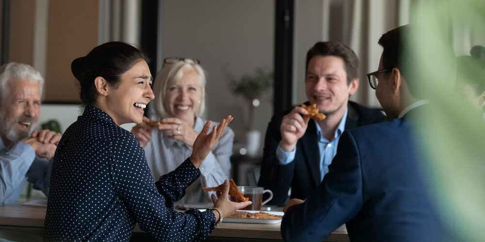 in office employees gathering for lunch