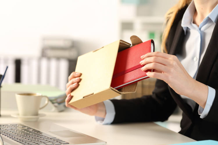 person opening employee gift